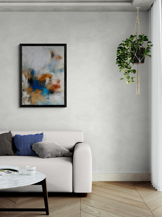 Living room with a sofa and an abstract painting in the wall