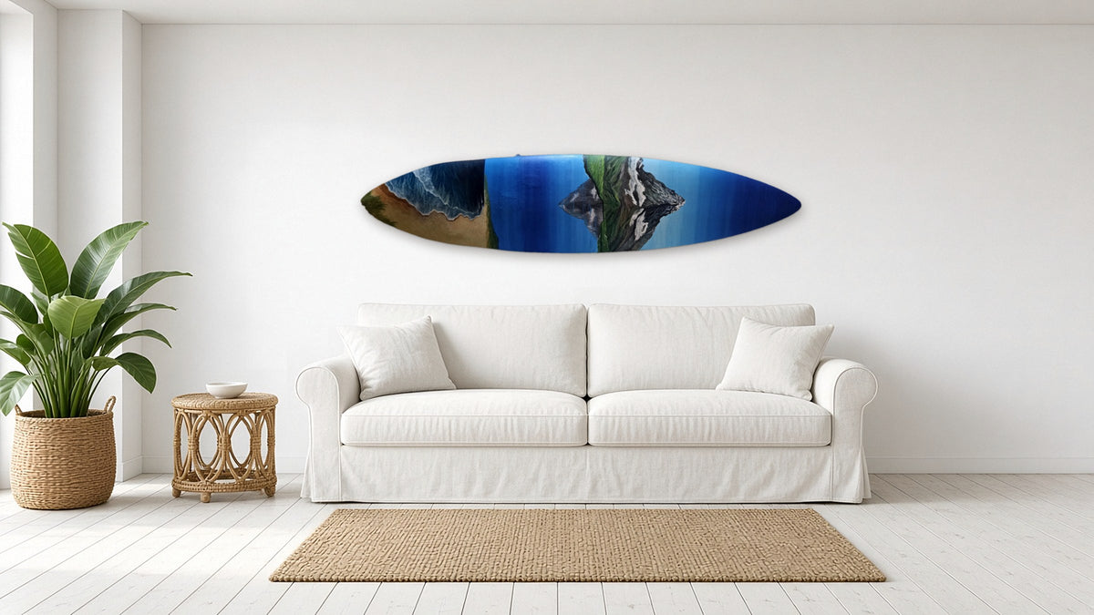 Serene Surfboard by Angie Hickson shown above a sofa in a coastal living room