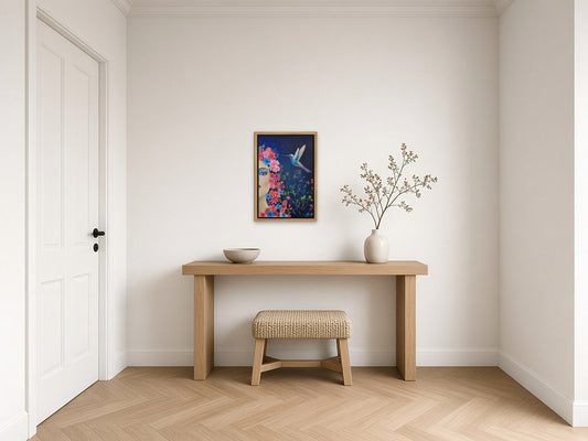 Shine by Angie Hickson shown framed in oak above a console table in an entrance hall