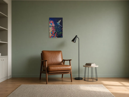 Shine by Angie Hickson shown above an armchair in a reading corner with a sage wall