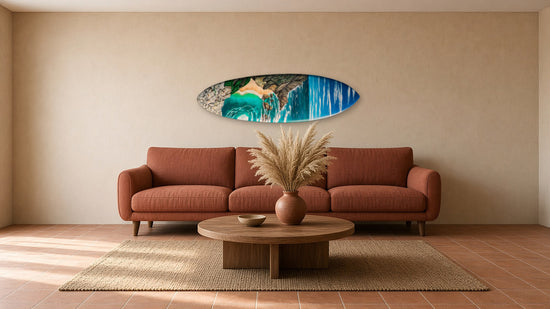 Ursa Surfboard by Angie Hickson shown above a sofa in a boho living room