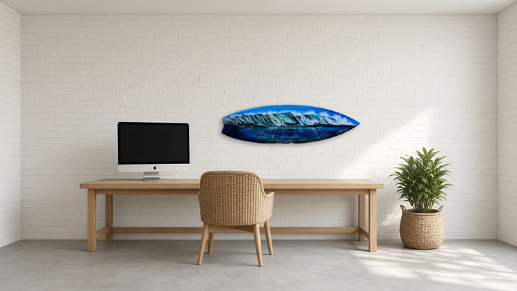 Waves Surfboard by Angie Hickson shown above a long desk in a surf studio